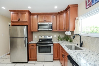Welcome home to this spacious 6-bedroom, 2-bath Colonial nestled - photo 6