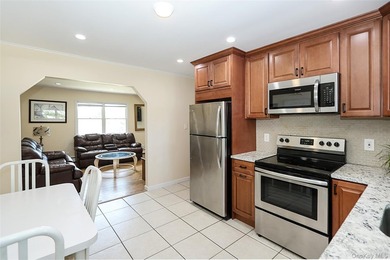 Welcome home to this spacious 6-bedroom, 2-bath Colonial nestled - photo 7
