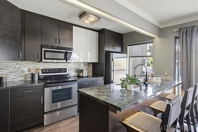 Welcome to this move-in ready 1-bedroom condo in the heart of - photo 5