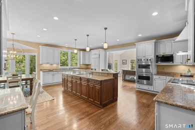 Beautifully rebuilt in 2006, this custom turn-key retreat offers - photo 12