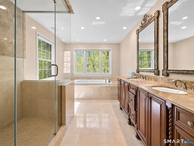 Beautifully rebuilt in 2006, this custom turn-key retreat offers - photo 23