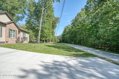 NEW CONSTRUCTION with stainless appliances in Lake Tansi Village - photo 3