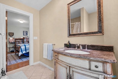 Beautifully rebuilt in 2006, this custom turn-key retreat offers - photo 26