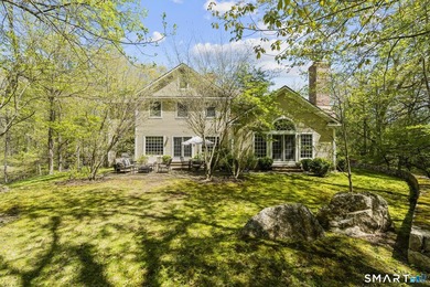 Beautifully rebuilt in 2006, this custom turn-key retreat offers - photo 29