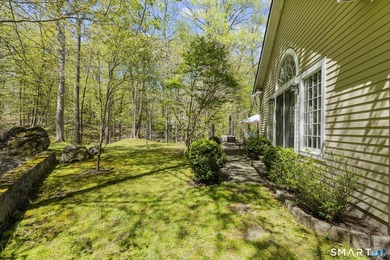 Beautifully rebuilt in 2006, this custom turn-key retreat offers - photo 32