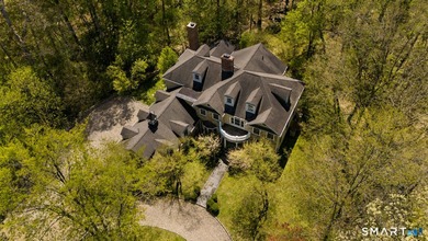 Beautifully rebuilt in 2006, this custom turn-key retreat offers - photo 33