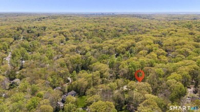 Beautifully rebuilt in 2006, this custom turn-key retreat offers - photo 35