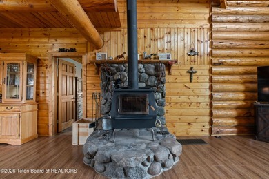 Stunning 2,532 sq ft log home on 90 working acres in the heart - photo 15