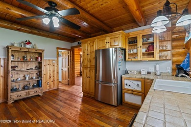 Stunning 2,532 sq ft log home on 90 working acres in the heart - photo 17