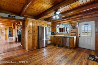 Stunning 2,532 sq ft log home on 90 working acres in the heart - photo 18