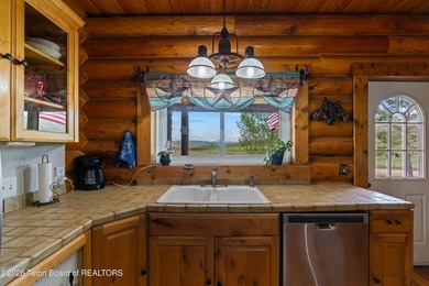 Stunning 2,532 sq ft log home on 90 working acres in the heart - photo 19