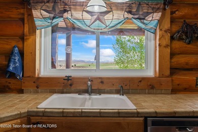 Stunning 2,532 sq ft log home on 90 working acres in the heart - photo 21