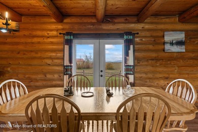 Stunning 2,532 sq ft log home on 90 working acres in the heart - photo 25