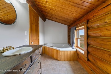 Stunning 2,532 sq ft log home on 90 working acres in the heart - photo 46