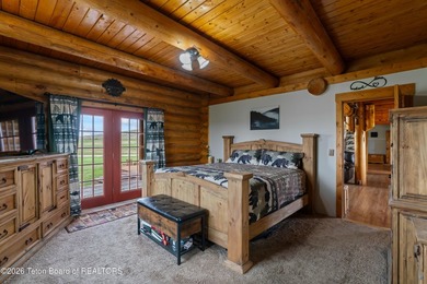 Stunning 2,532 sq ft log home on 90 working acres in the heart - photo 49