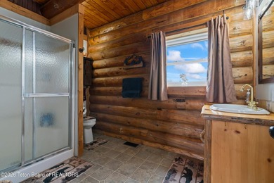 Stunning 2,532 sq ft log home on 90 working acres in the heart - photo 50