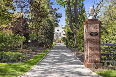 Beyond private gates, a tree-lined drive reveals Turtle Pond - photo 3