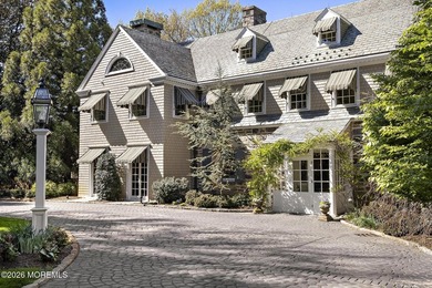 Beyond private gates, a tree-lined drive reveals Turtle Pond - photo 5