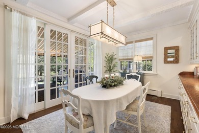 Beyond private gates, a tree-lined drive reveals Turtle Pond - photo 9
