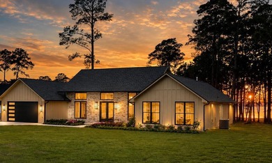 Experience lakeside living at its finest in this stunning new - photo 1