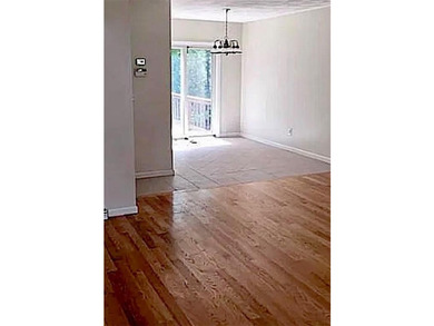 Townhouse style condo with full basement. Located at the end in - photo 3