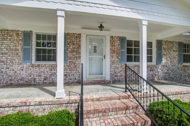Welcome to this charming 3-bedroom brick ranch nestled on a - photo 3