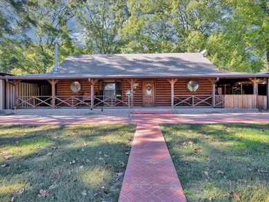 This lake property is special, featuring multiple living - photo 1