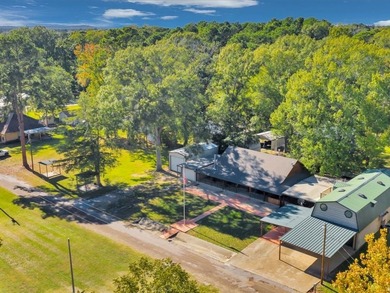 This lake property is special, featuring multiple living - photo 3