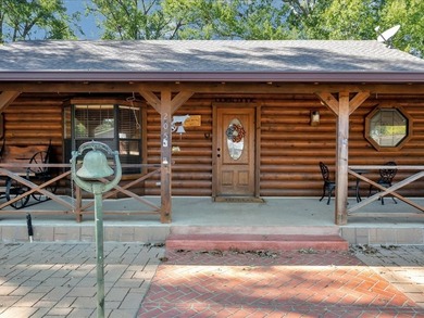 This lake property is special, featuring multiple living - photo 4