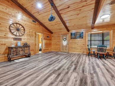 This lake property is special, featuring multiple living - photo 6