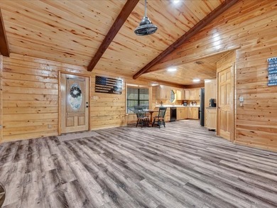 This lake property is special, featuring multiple living - photo 7