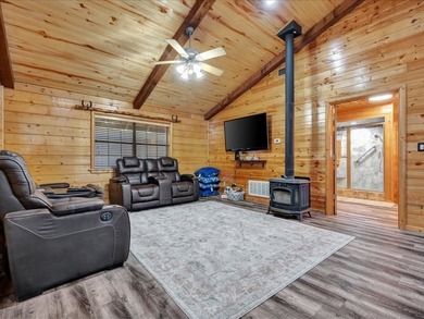 This lake property is special, featuring multiple living - photo 9