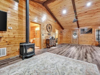 This lake property is special, featuring multiple living - photo 10