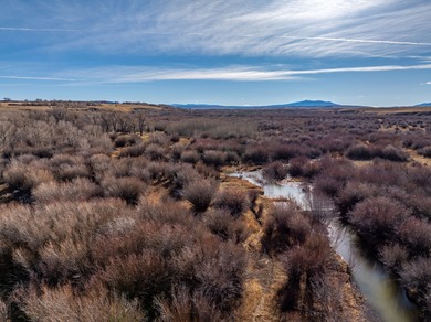 Elk Mountain Ranch consists of 4215 deeded acres and a 640 acre - photo 2