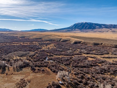 Elk Mountain Ranch consists of 4215 deeded acres and a 640 acre - photo 3