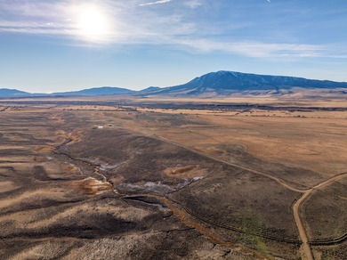 Elk Mountain Ranch consists of 4215 deeded acres and a 640 acre - photo 10
