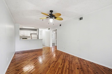 Welcome to this charming two-bedroom, two-bathroom condo in the