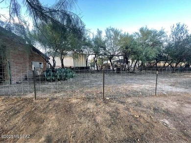 Western Charmer!!! This unique property has 3 houses on 5.56