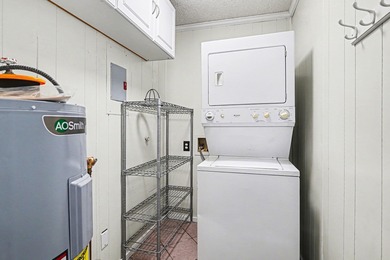 Welcome to this charming two-bedroom, two-bathroom condo in the