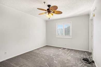 Welcome to this charming two-bedroom, two-bathroom condo in the