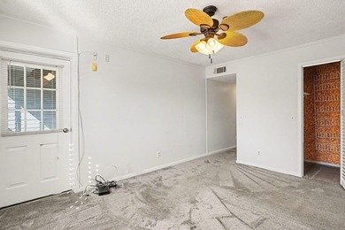 Welcome to this charming two-bedroom, two-bathroom condo in the