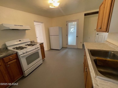 Western Charmer!!! This unique property has 3 houses on 5.56