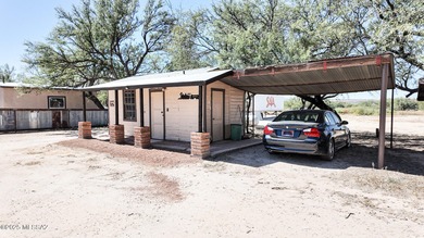 Western Charmer!!! This unique property has 3 houses on 5.56