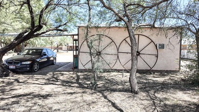 Western Charmer!!! This unique property has 3 houses on 5.56