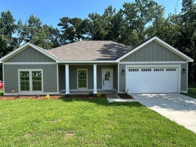 NEW CONSTRUCTION IN REFLECTIONS ON THE WATER, A GATED COMMUNITY - photo 1