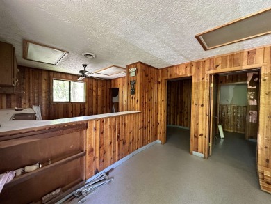 FLIPPIN COMMERCIAL BUILDING IN HIGHLY VISIBLE LOCATION W/HWY 62B