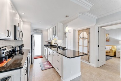 Live the South Florida lifestyle in this beautifully updated 2 - photo 4