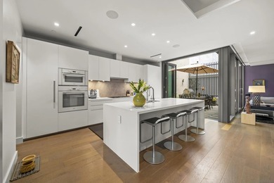 Combining the scale and privacy of a single-family home with the - photo 6