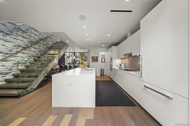 Combining the scale and privacy of a single-family home with the - photo 7