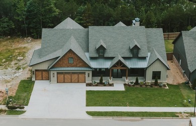 Discover the potential of this custom home located in the - photo 3